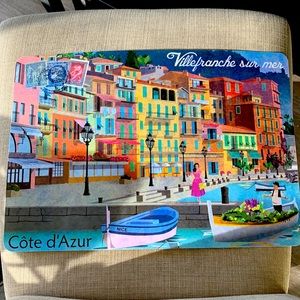 Brand new hard plastic easily to wipe down placemats. Four places in France.